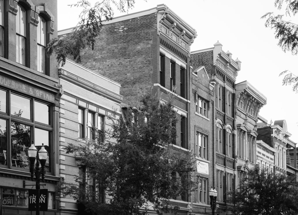 Historic buildings along Vine Street in Over-The-Rhine, Cincinnati, Ohio in black white