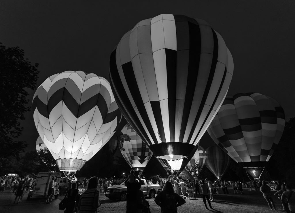 Hot air balloon festival glowing at night, Ohio in black white