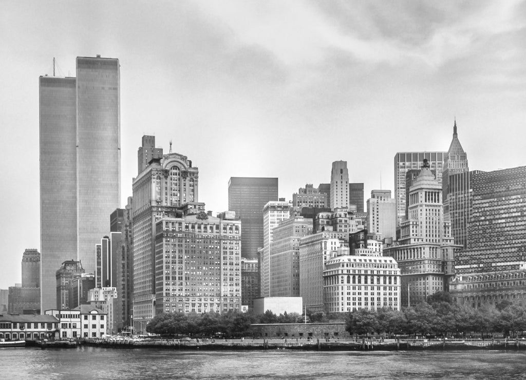 New York City skyline from NJ with World Trade Center featured as landmark of Twin Towers, destroyed in September 11, 2001. Sepia background, vintage style. Lower Manhattan in New YorkC, United States in black white