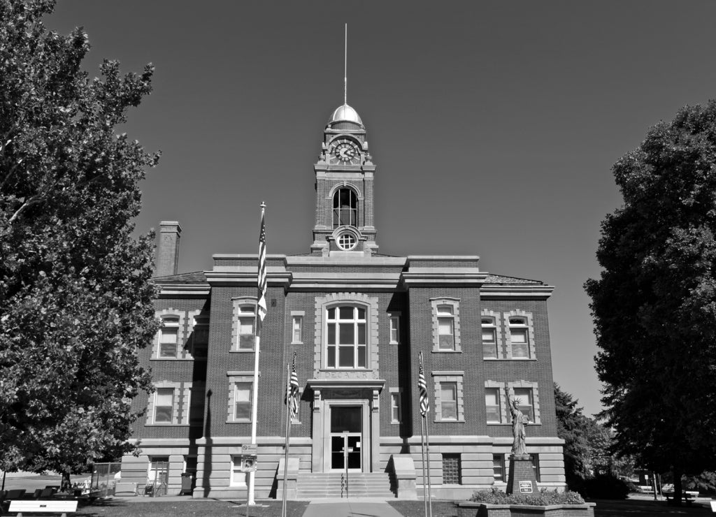 The Decatur County Iowa Courthouse stands in the courthouse square of Leon, Iowa. This courthouse showcases the Renaissance Revival architecture style in black white