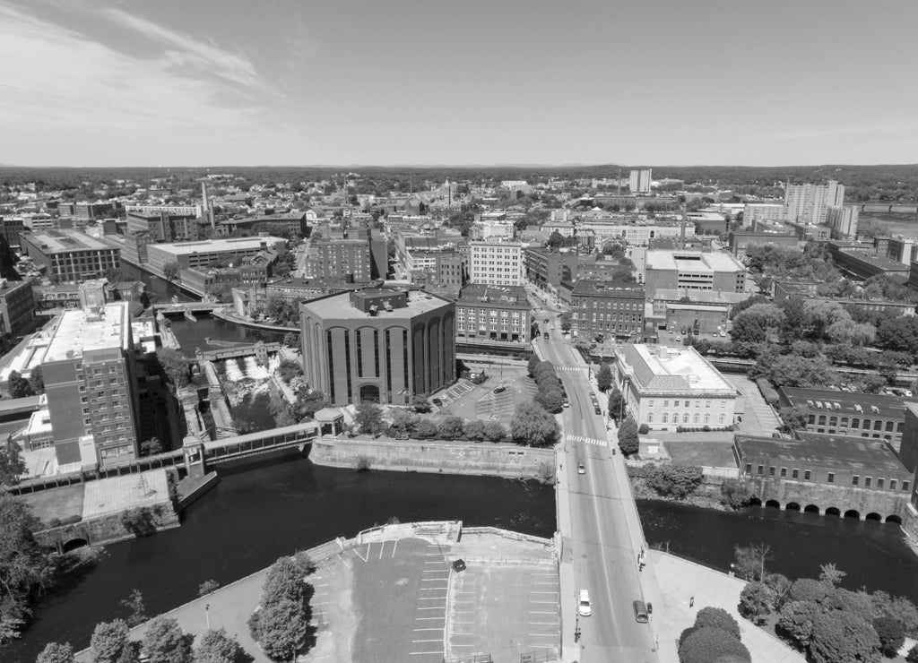 Lowell historic downtown and Concord River Massachusetts in black white