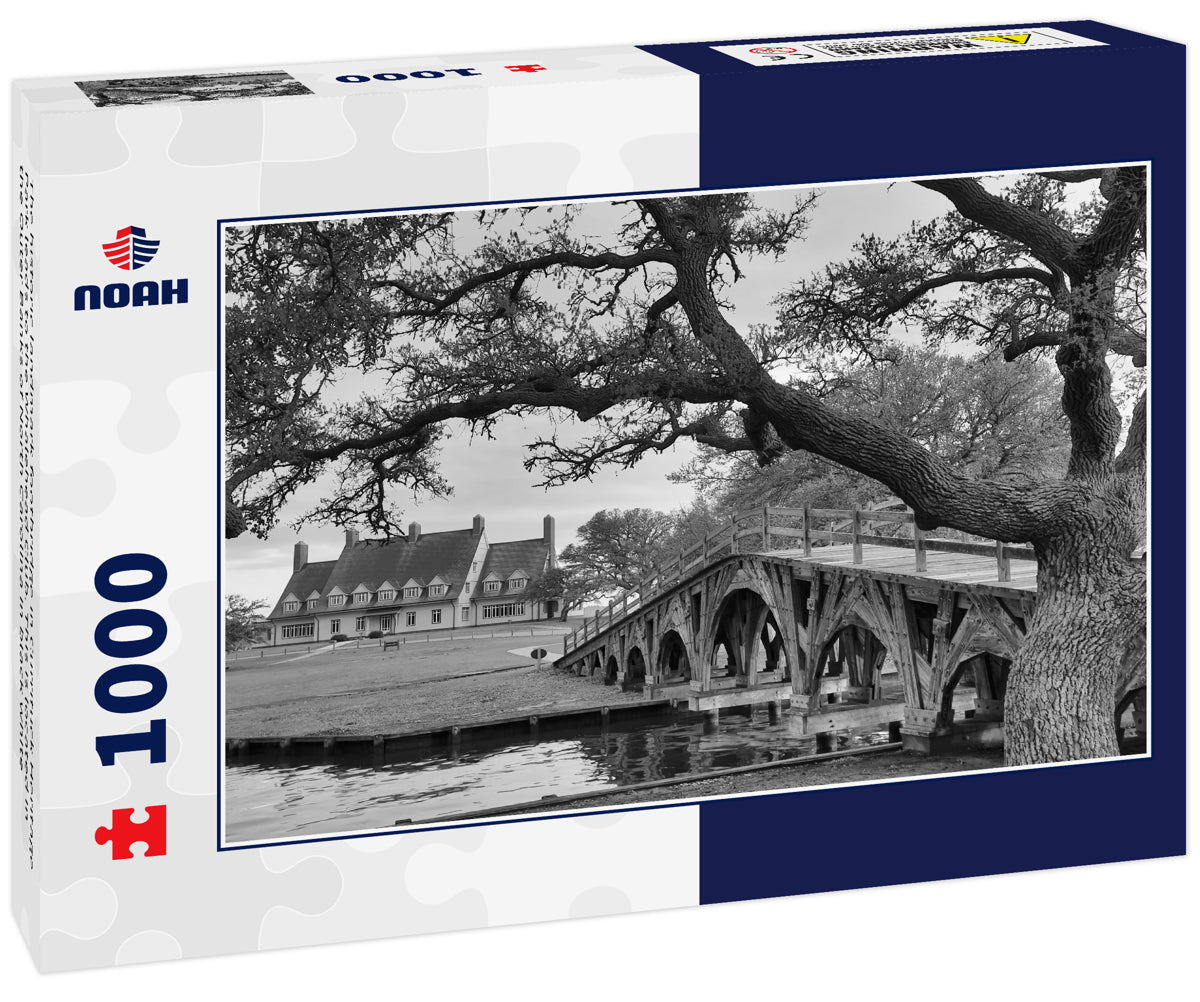 The historic landmark footbridge in Currituck Heritage Park leads to the Whalehead Club. This is located in the Outer Banks of North Carolina in black white