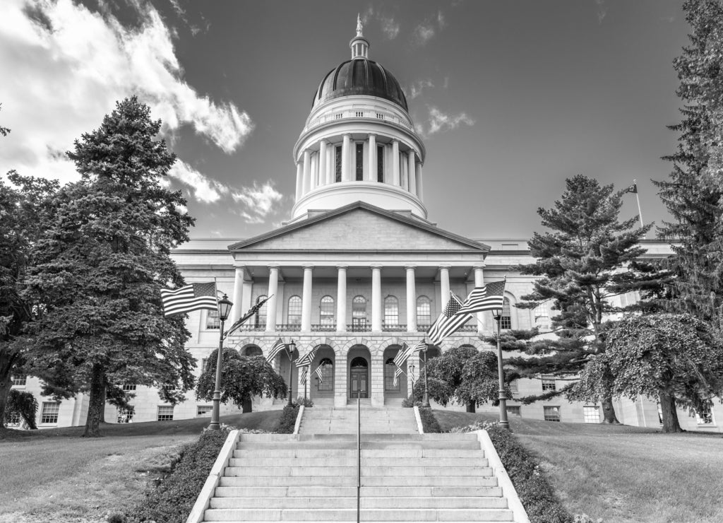 Maine State House, in Augusta, on a sunny day. The building was completed in 1832, one year after Augusta became the capital of Maine in black white