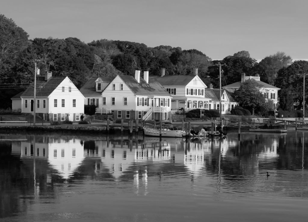 Panoramic view of residential homes by the Mystic River during a vibrant sunrise. Taken in Mystic, Stonington, Connecticut, United States in black white