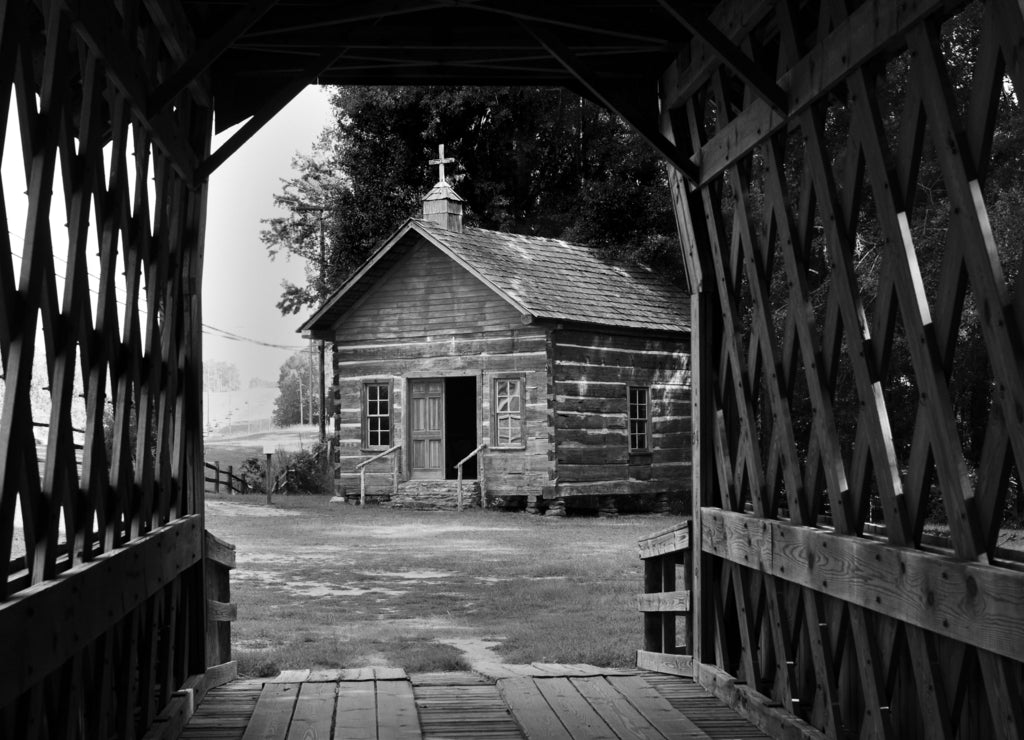 Log house country church in Troy,Alabama in black white