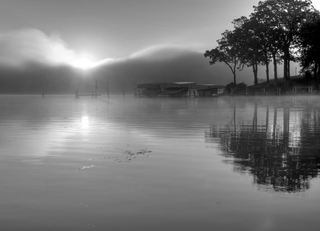 Sunrise Over glacial Lake Okoboji, Iowa USA in black white
