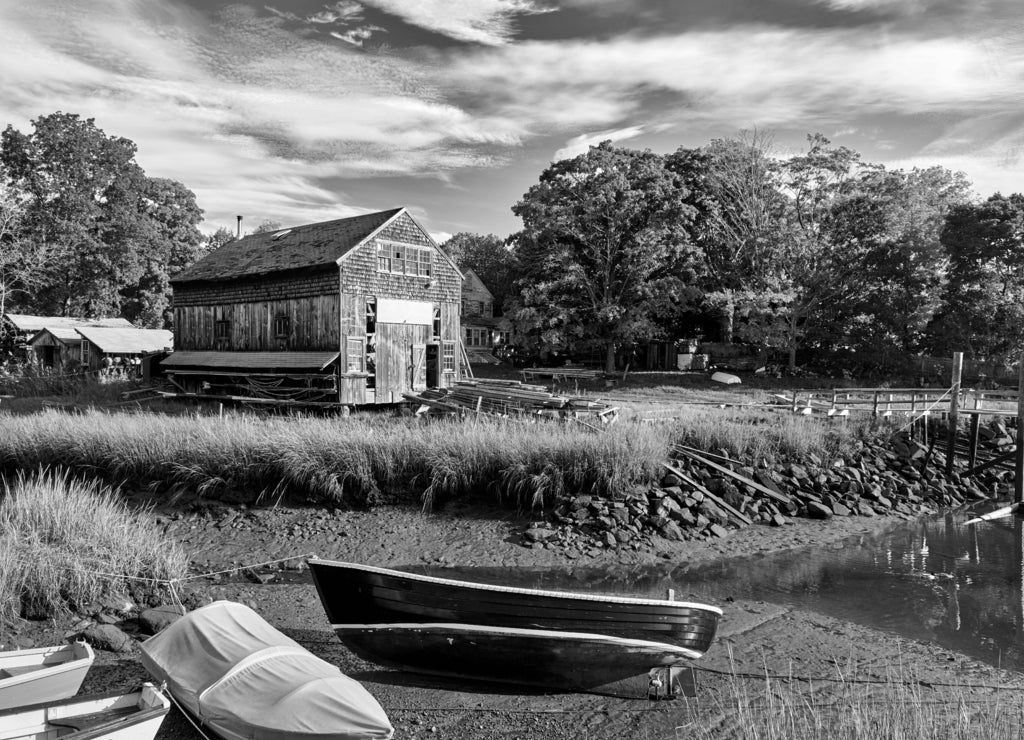 Fall in Essex, Massachusetts, USA. Autumn scene at old wharf in black white