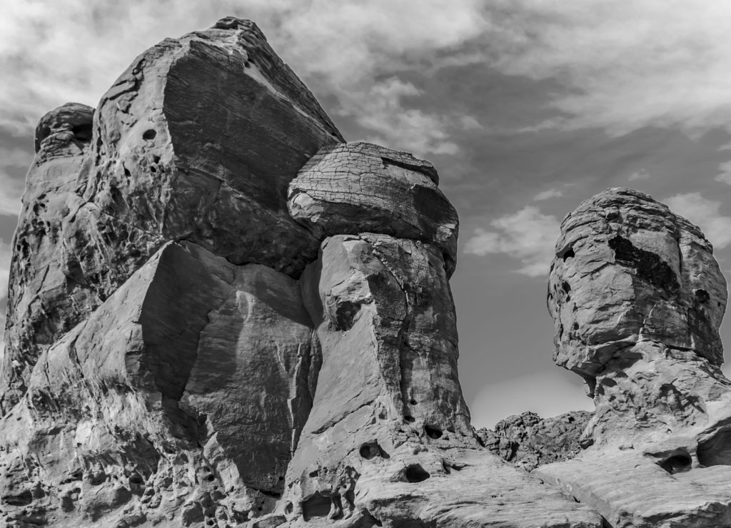 The Seven Sisters, a bright red Aztec sandstone rock formation in the Valley of Fire State Park in Nevada, USA in black white