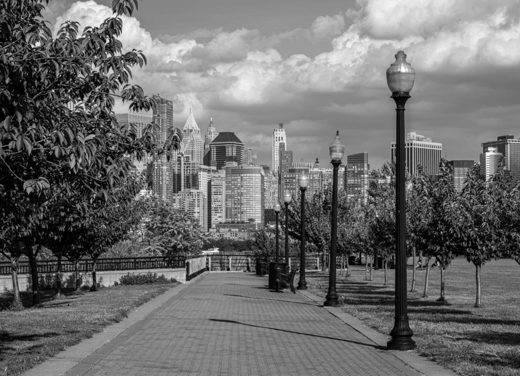 Liberty State Park is a park in the U.S. state of New Jersey opposite both Liberty Island and Ellis Island in black white