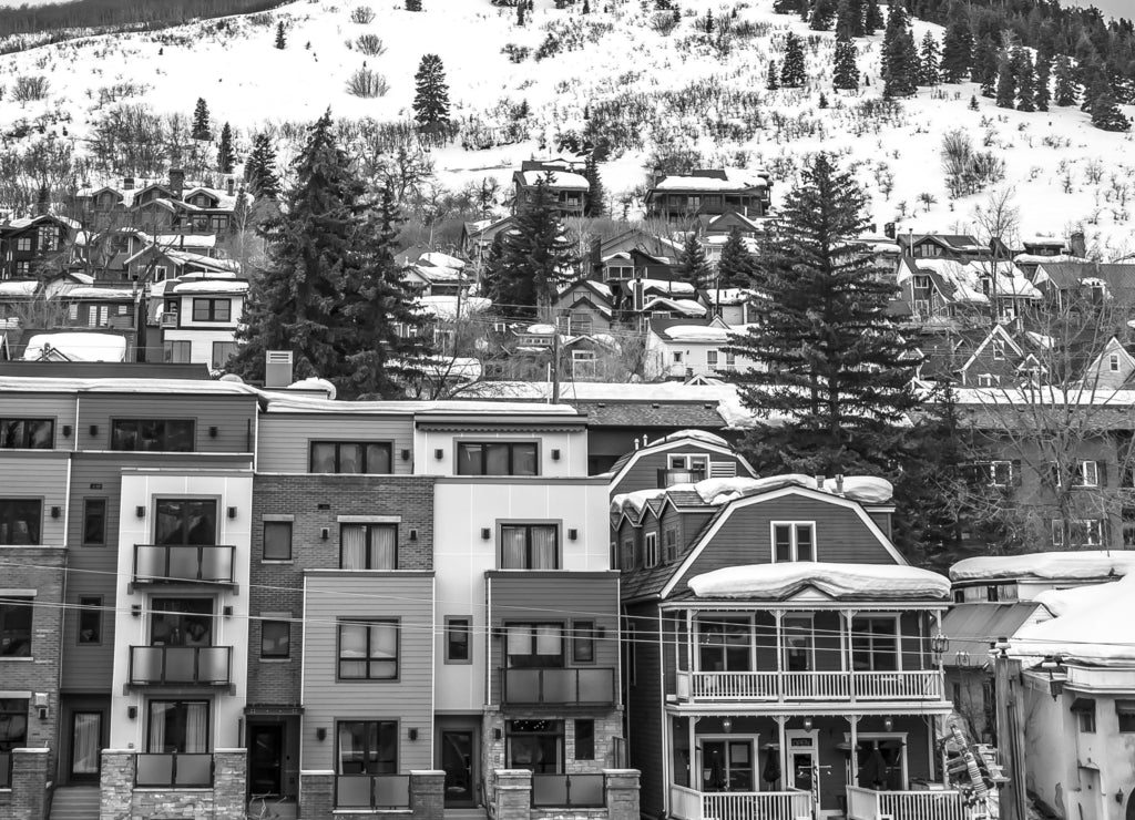 Panorama Winter in Park City Utah with luxury buildings and houses on a snowy mountain in black white