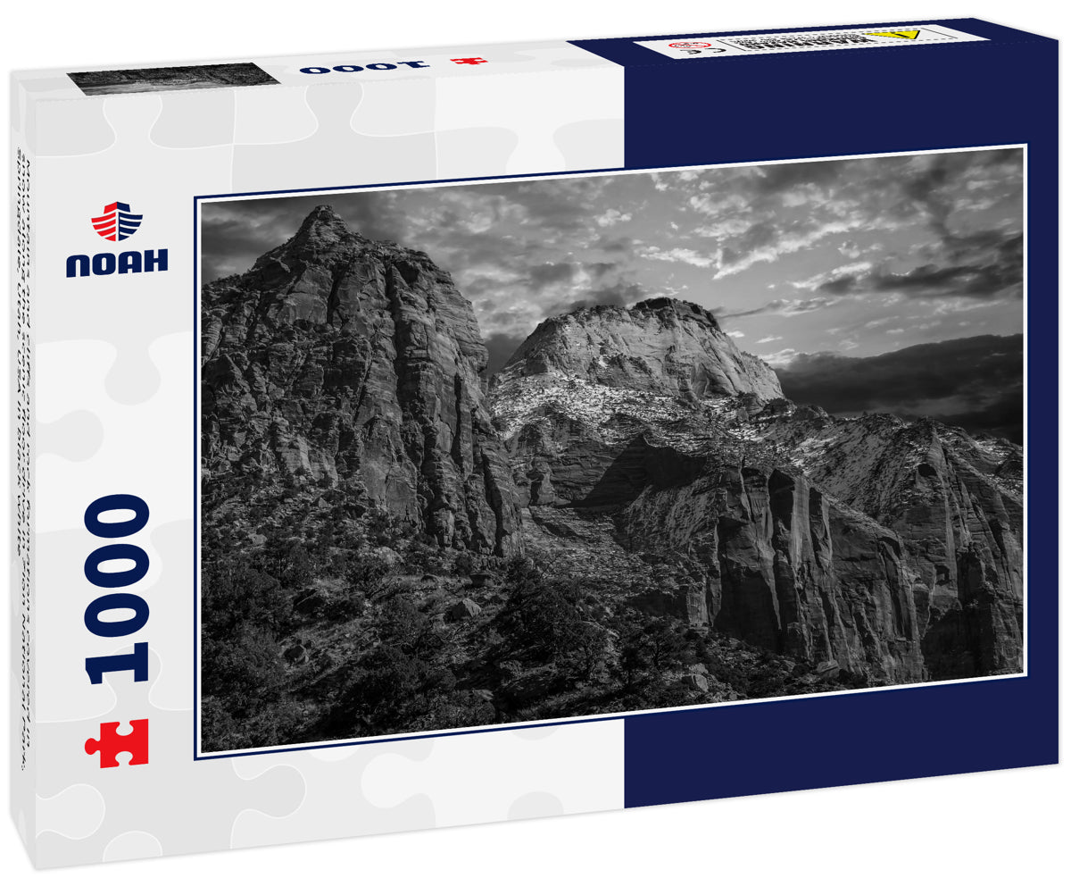 Mountains and cliffs and rock formations covered in snow along the scenic floor drive in Zion National Park, Springdale, Utah, USA in black white