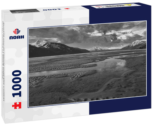 Sunset storm clouds over the Chilkat River, Alaska in black white