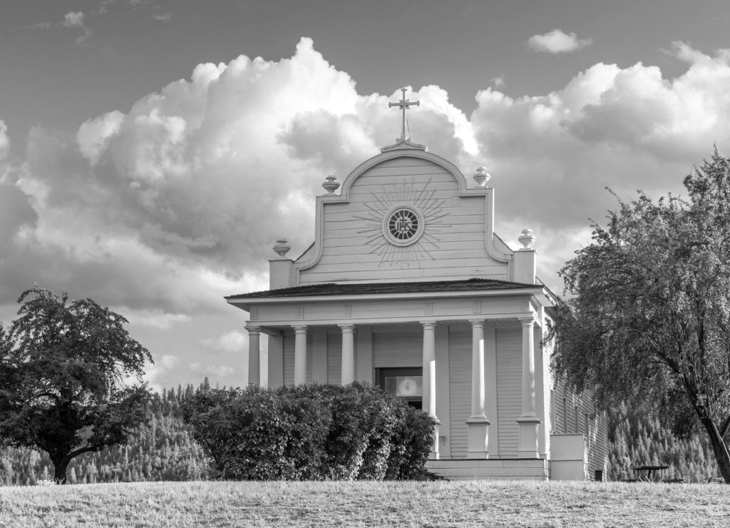 The Old Mission State Park in North Idaho, USA, preserving the Mission of the Sacred Heart, or Cataldo Mission historic Church and Parish House in black white