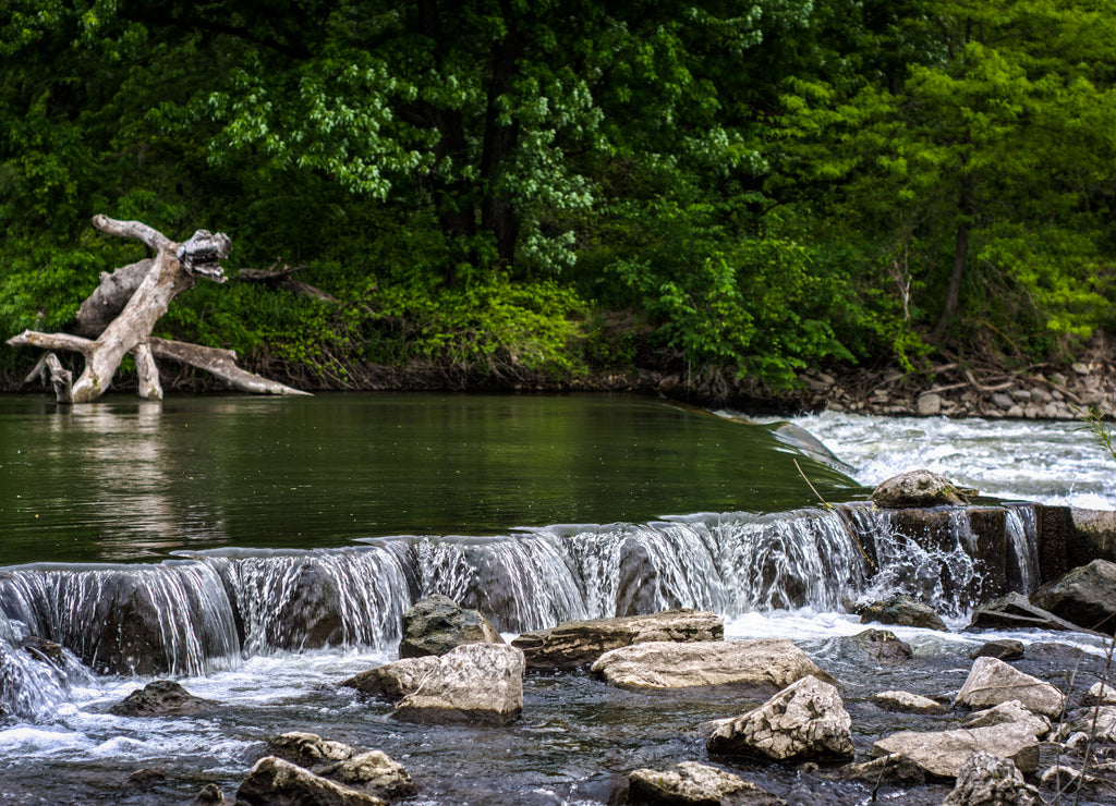 River running over a little waterfall in Iowa USA