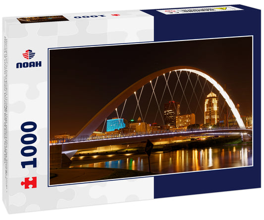 Women of Achievement Bridge that spans the Des Moines River - one of the central features of Des Moines, the skyline of Des Moines is clearly visible through the lit arch, Iowa USA  