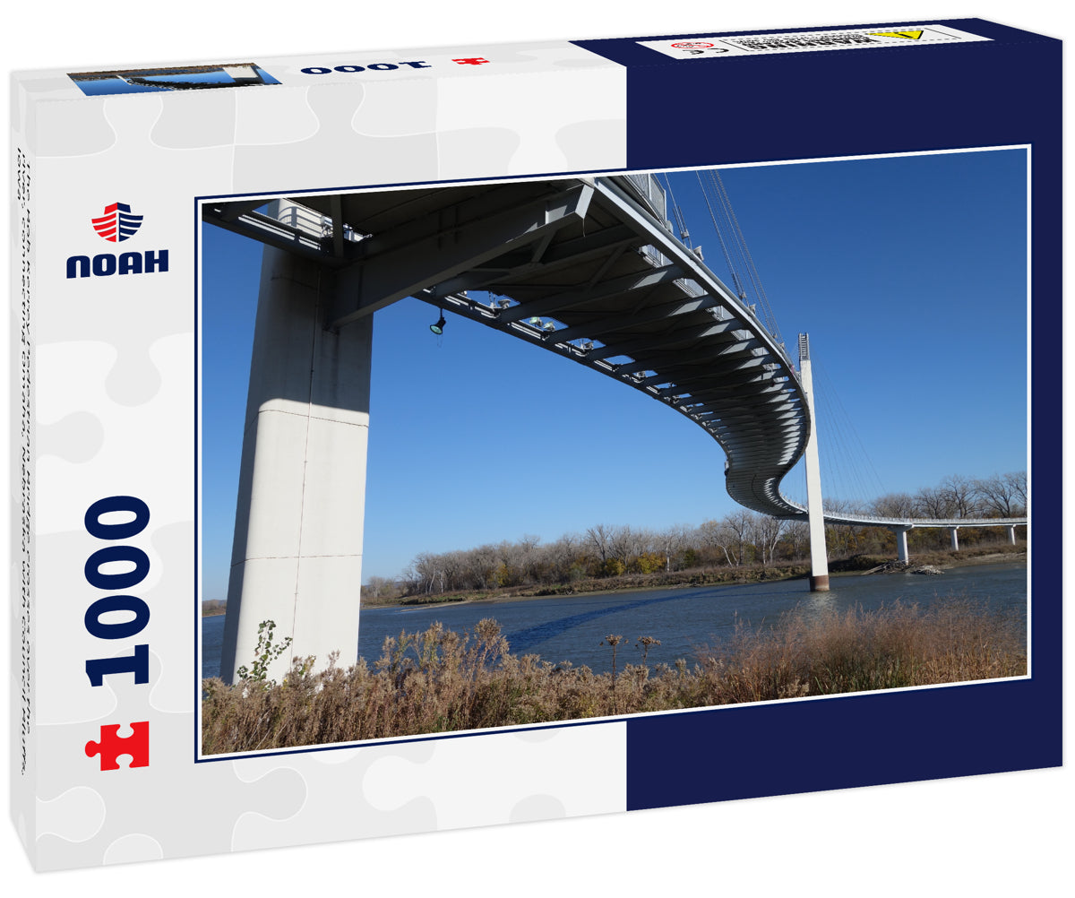 The Bob Kerrey Pedestrian Bridge crosses over the river, connecting Omaha, Nebraska with Council Bluffs, Iowa