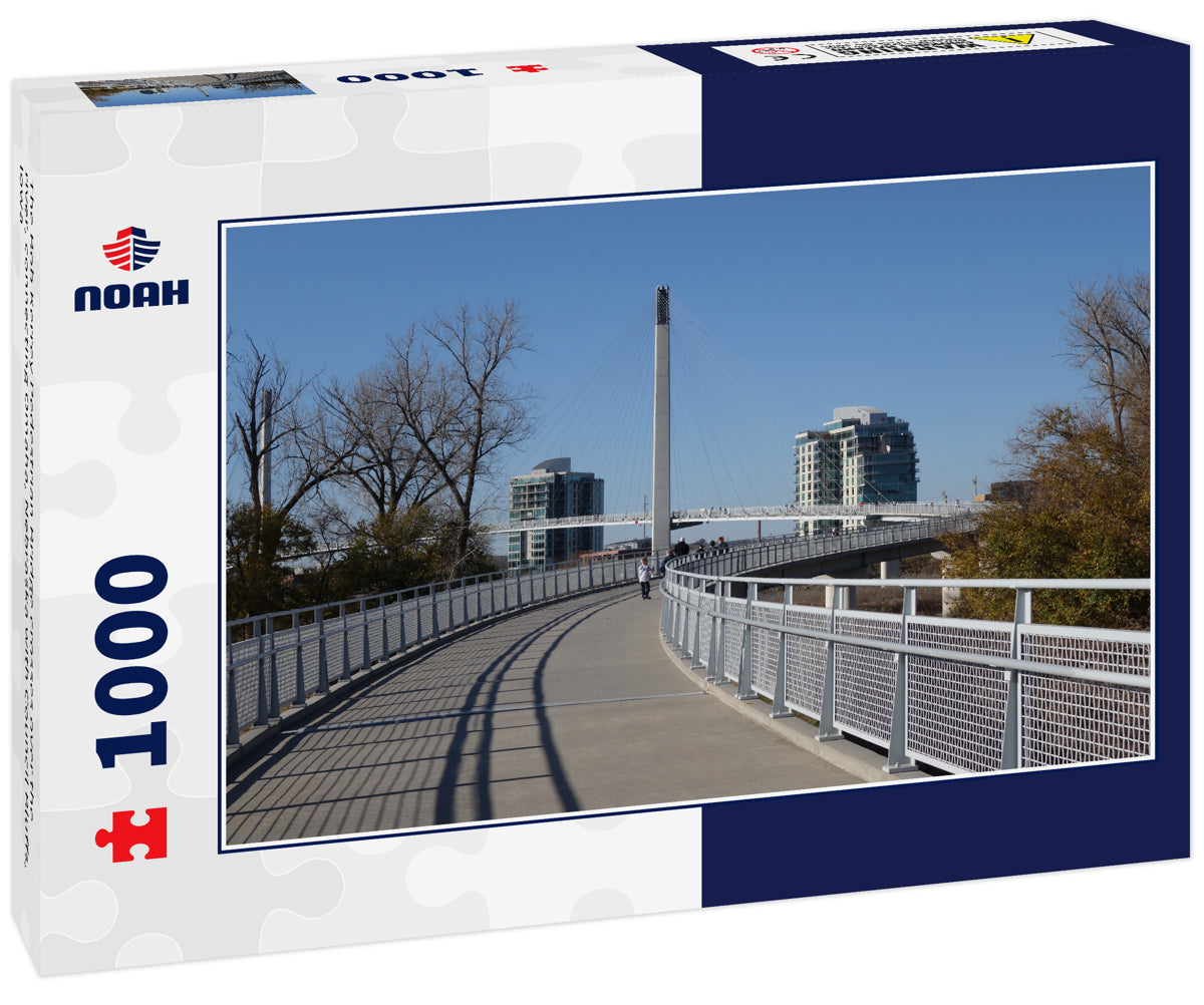 The Bob Kerrey Pedestrian Bridge crosses over the river, connecting Omaha, Nebraska with Council Bluffs, Iowa