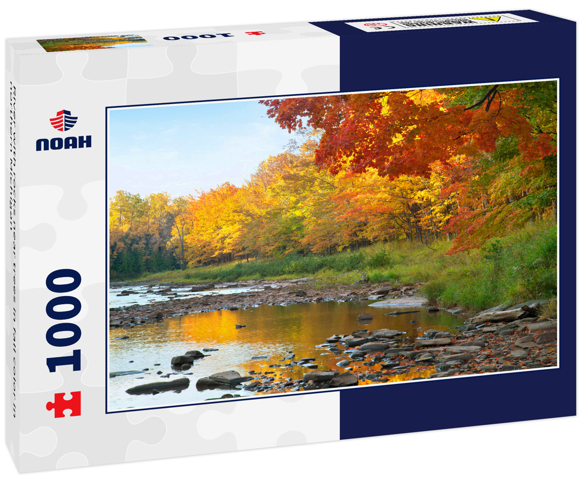 River with rocks near trees in fall color in northern Michigan