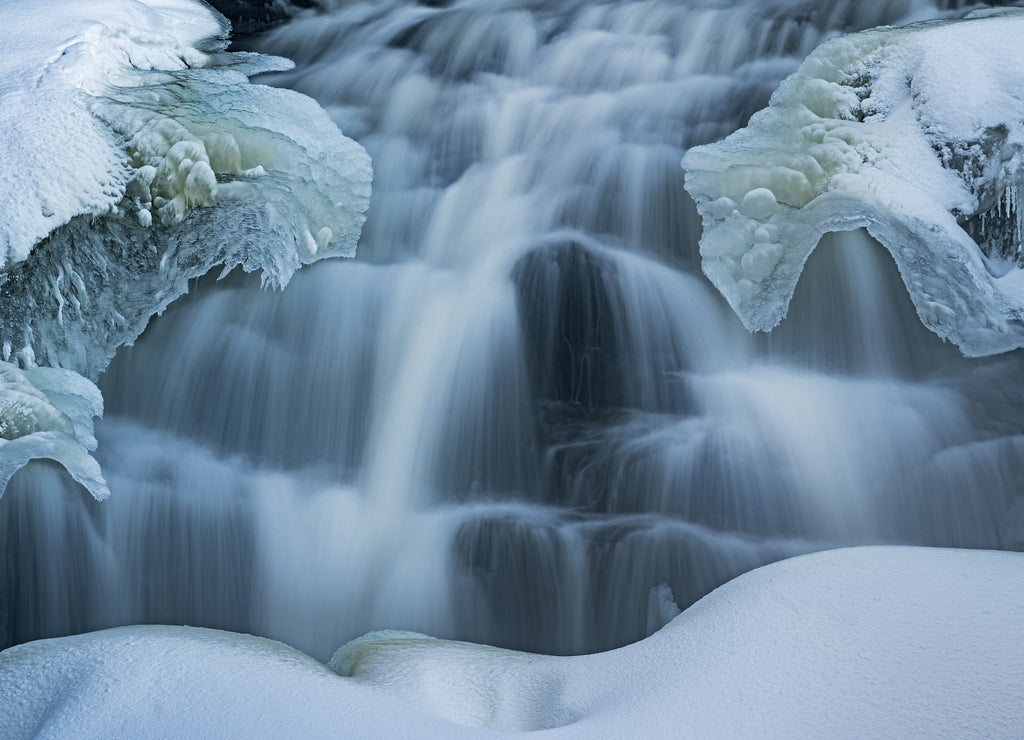 Winter landscape of frozen Bond Falls, Michigan's Upper Peninsula, USA