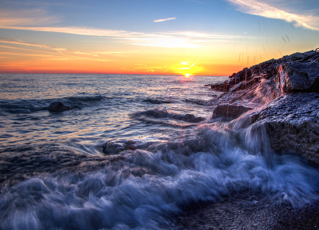 Lake Huron beach with a sunrise horizon. Lexington, Michigan