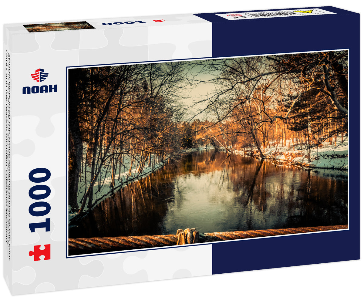 Winter view from the stone walking bridge of the Flint River in the Richfield County Park, Genesee County Parks and Recreation Richfield Township Michigan