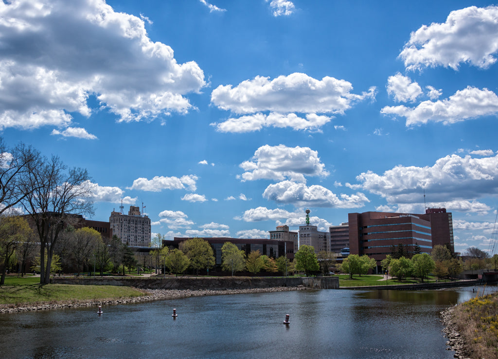 Flint, Michigan skyline and the Flint River. Known widely for their water quality and safety issues. Shot in on a beautiful spring da