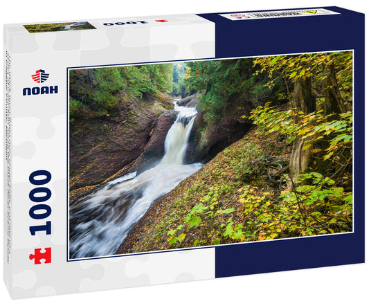 The Black River flows over Gorge Falls, just one of a series of waterfalls along the Black River Scenic Byway in Gogebic County, Michigan