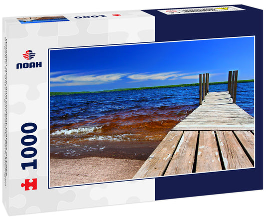 Wooden dock and choppy waters of Lake Gogebic at Ontonagon County Park Michigan