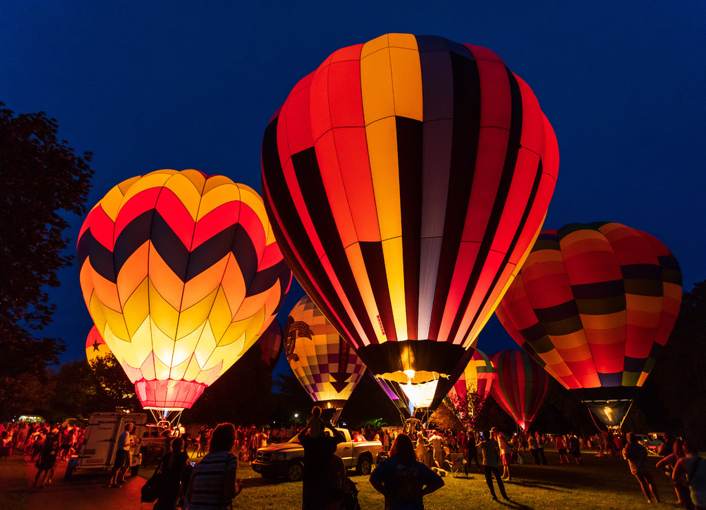 Hot air balloon festival glowing at night, Ohio