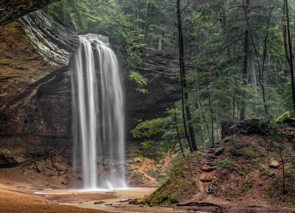 Hocking Hills Beauty - In the Hocking Hills of Ohio, a beautiful, tall, free-falling waterfall graces Ash Cave, an enormous recess cave with an overhanging cliff of Black Hand Sandstone