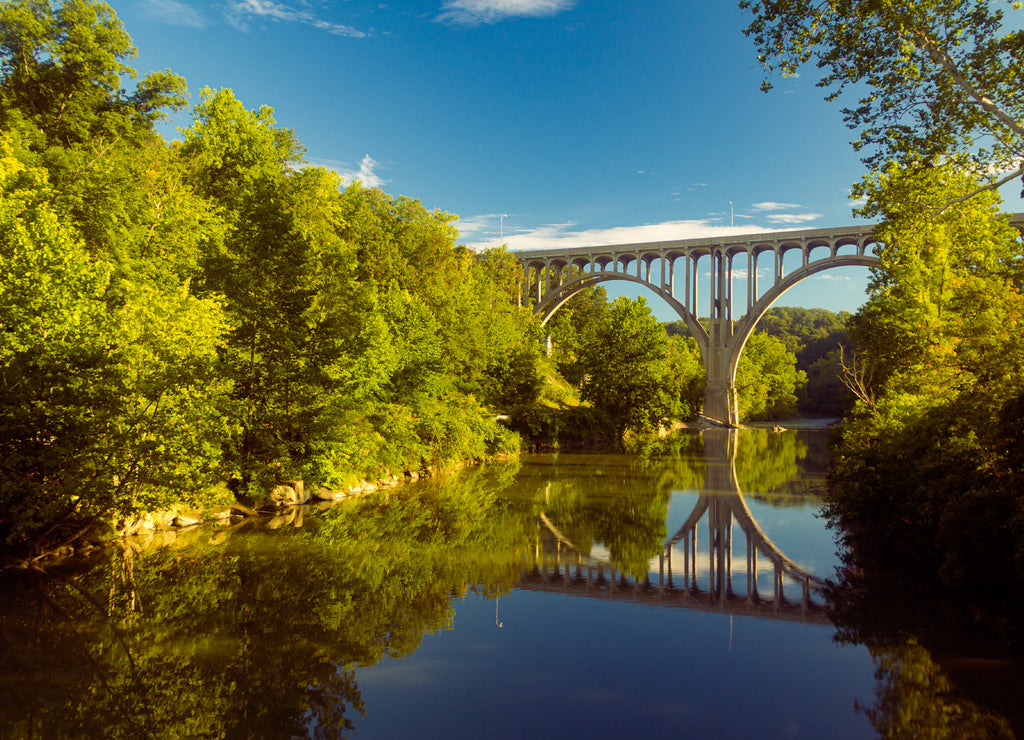 Arch bridge spanning a river in Cuyahoga Valley National Park, Ohio