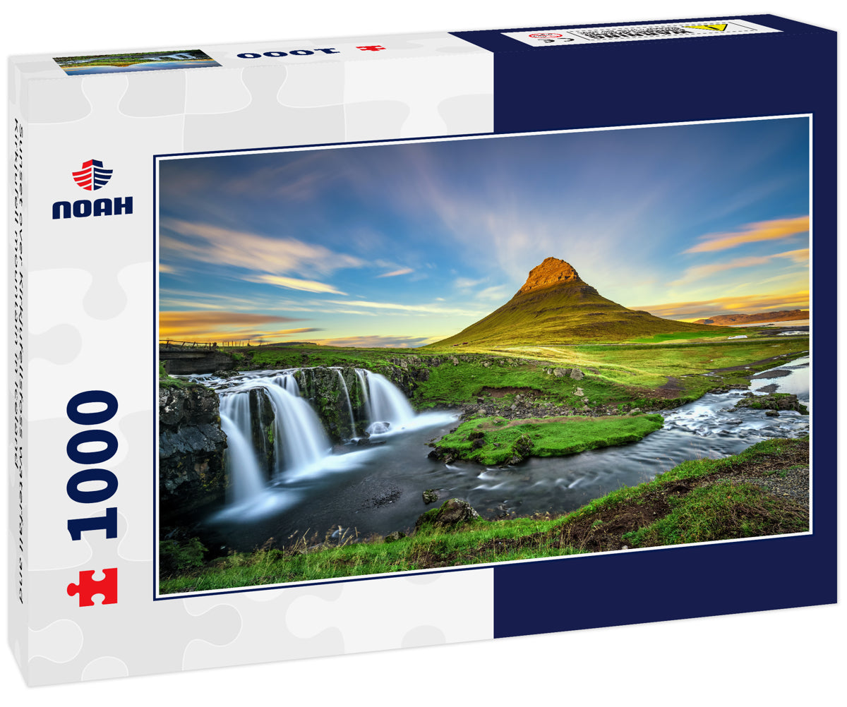 Sunset over Kirkjufellsfoss waterfall and Kirkjufell mountain in Iceland