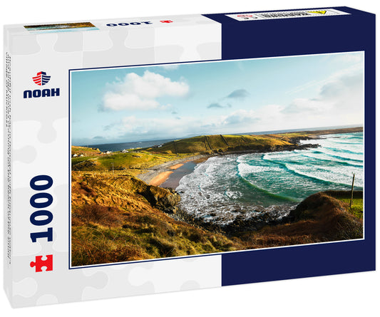 Beautiful Irish bay in Donegal with turquoise waters and large waves crashing on the beach of the small village of Muckross