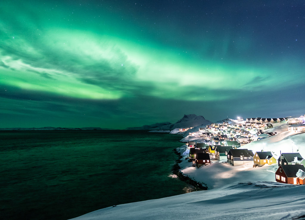 Aurora Borealis (Northern Lights) over the night sky of Nuuk, the capital of Greenland