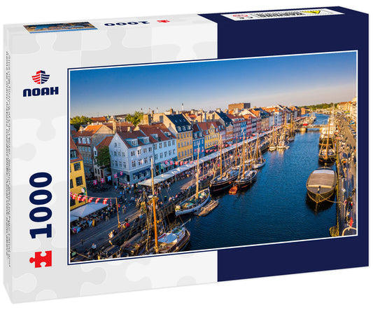 Amazing historical city center. Nyhavn New Harbour canal and entertainment district in Copenhagen, Denmark. The canal is home to many historic wooden ships. Aerial view from above