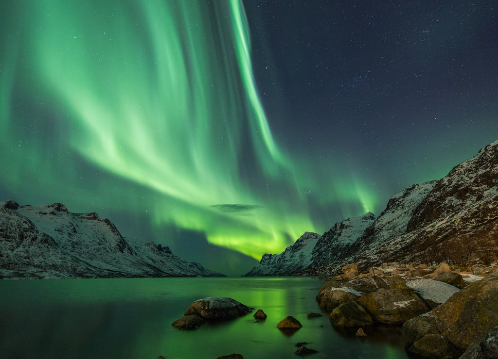 Aurora Borealis reflected between two fjords in Tromsø