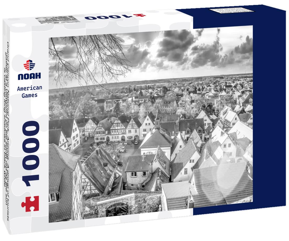 Noah Jigsaw Puzzle Grand Canyon National Park, Arizona. A group of tourists gather at a viewpoint on the south rim as the sun is casting long shadows in black white 1000 pieces