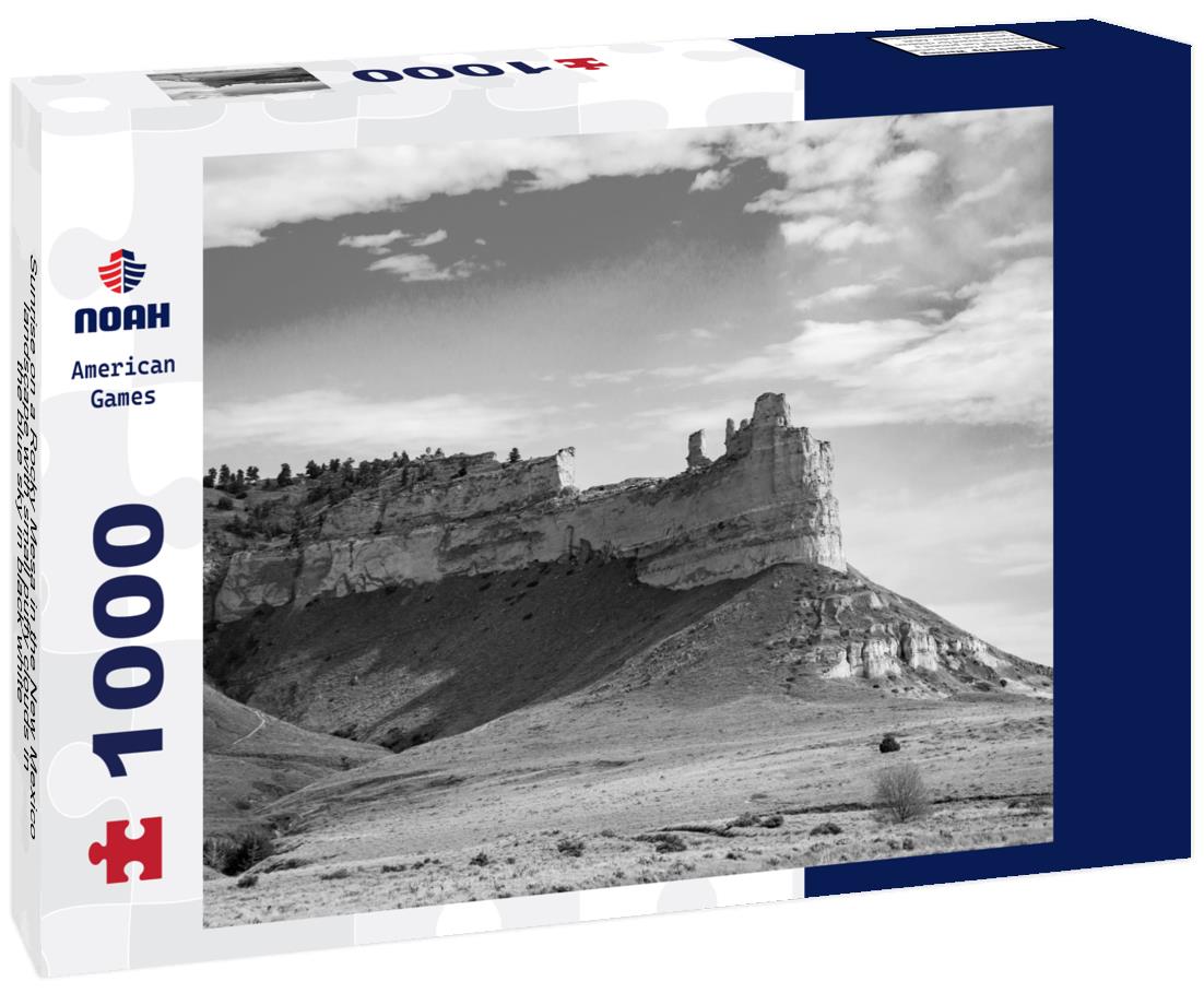 Noah Jigsaw Puzzle Sunrise on a Rocky Mesa in the New Mexico landscape with small puffy clouds in the blue sky in black white 1000 pieces