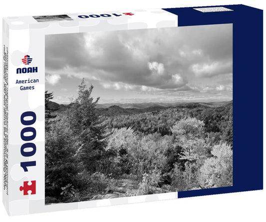 Noah Jigsaw Puzzle chimney rock national historic site. It is a prominent geological rock formation in western Nebraska, rising nearly 300 feet above the surrounding North Platte River valley in black white 1000 pieces