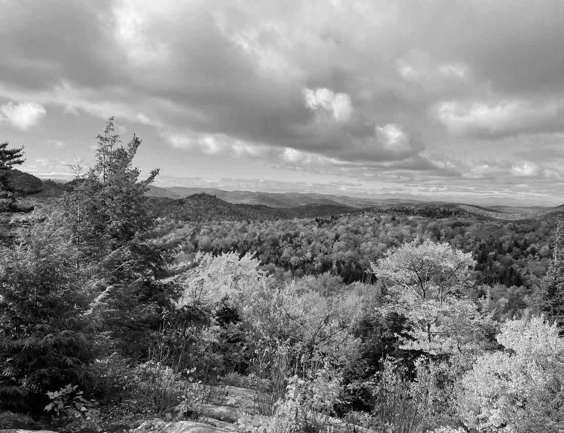Noah Jigsaw Puzzle chimney rock national historic site. It is a prominent geological rock formation in western Nebraska, rising nearly 300 feet above the surrounding North Platte River valley in black white 1000 pieces