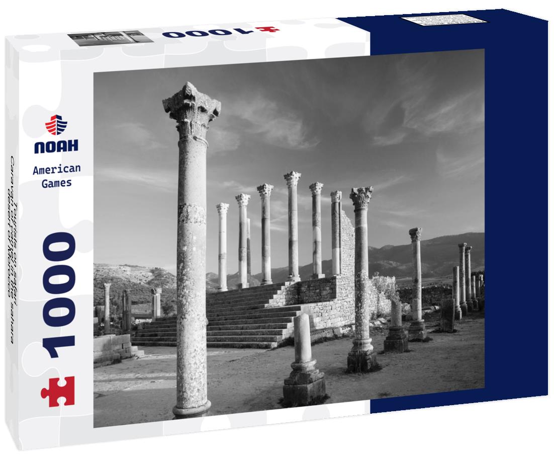 Noah Jigsaw Puzzle Tourists on safari - Caravan of camel in the sahara desert of Morocco - General view of the Merzouga hotels district - Morocco, Africa in black white 1000 pieces