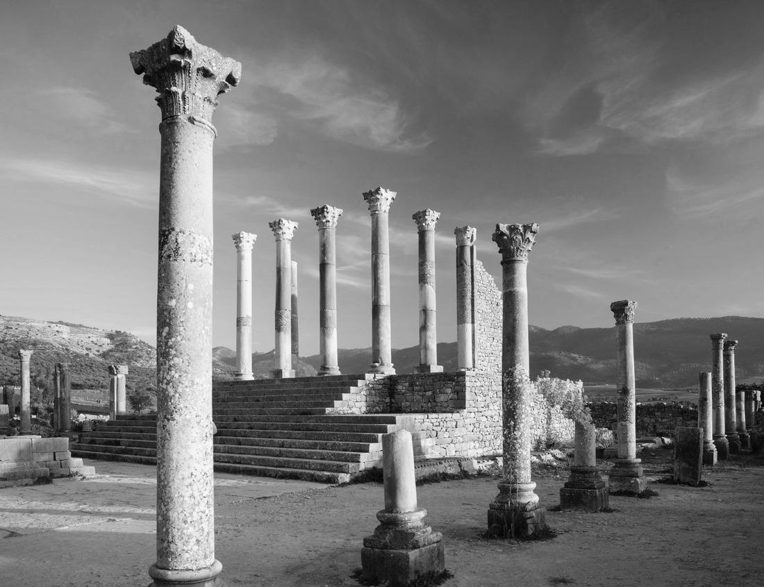 Noah Jigsaw Puzzle Tourists on safari - Caravan of camel in the sahara desert of Morocco - General view of the Merzouga hotels district - Morocco, Africa in black white 1000 pieces