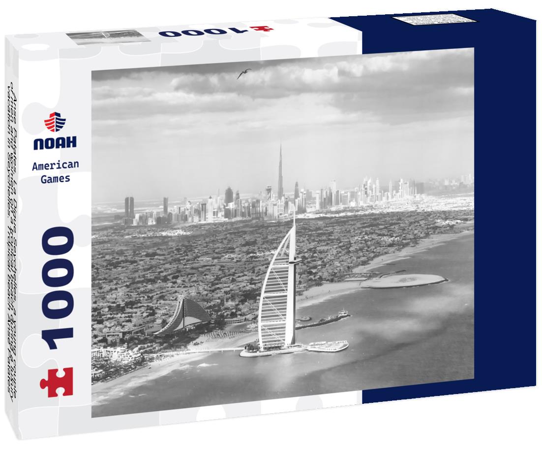 Noah Jigsaw Puzzle Anse Patates, La Digue Seychelles, a young couple of men and women on a tropical beach during a luxury vacation in Seychelles. Tropical beach Anse Patates, La Digue Seychelles in black white 1000 pieces