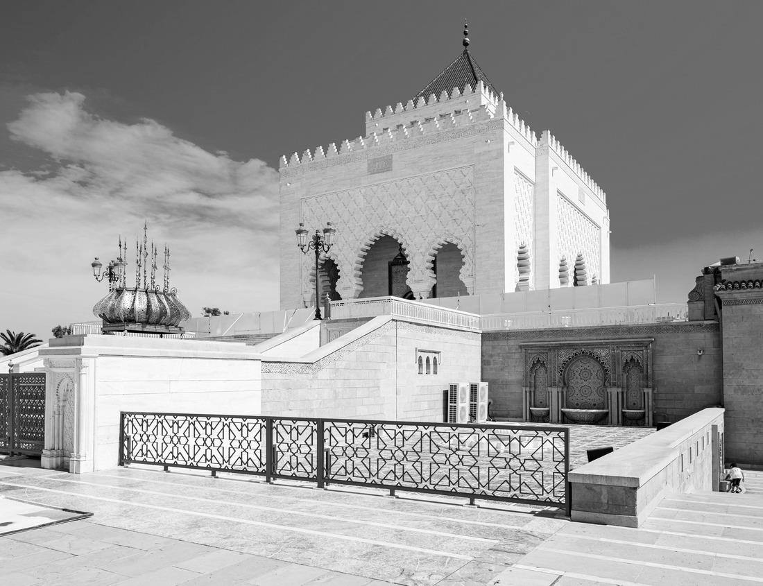 Noah Jigsaw Puzzle A picturesque street in the city of St. Gallen with houses in the traditional Swiss style under blossoming trees, an old church in the background in black white 1000 pieces