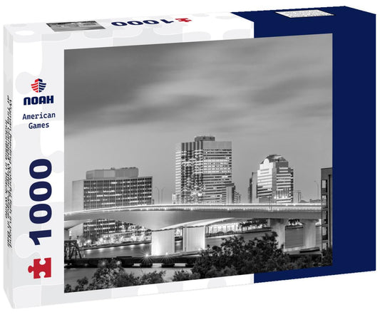 Noah Jigsaw Puzzle Woman feeding colorful fish in pond at Tirta Gangga Water Palace in Bali, Indonesia in black white 1000 pieces