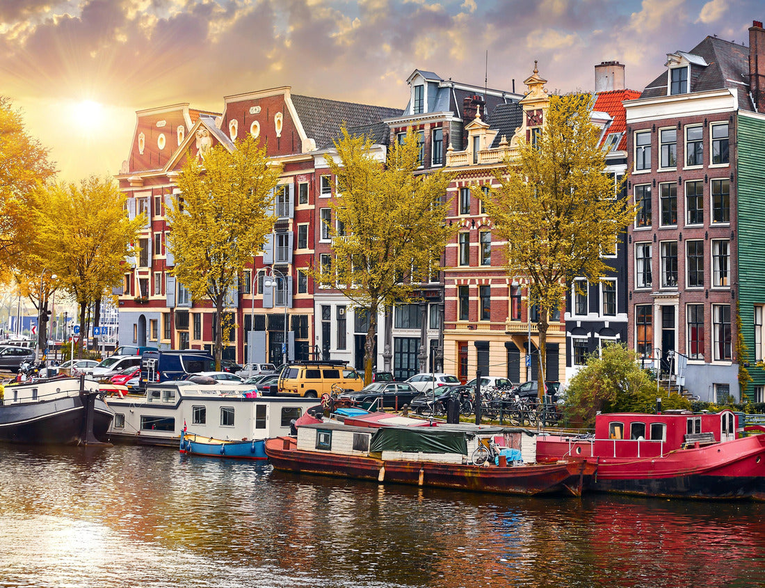 Noah Jigsaw Puzzle Amsterdam, Netherlands. Panorama of the famous dancing houses on the river Amstel, water channels with house boats 1000 pieces