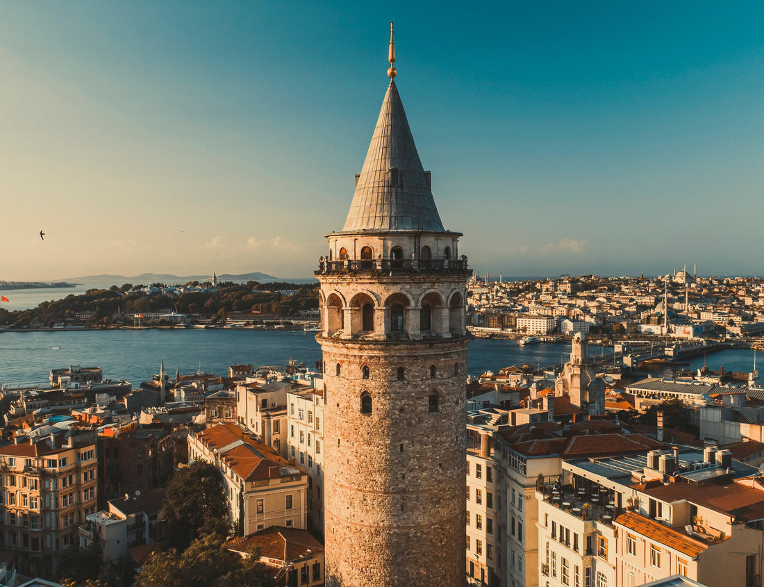 Noah Jigsaw Puzzle Galata tower. Close-up photo of Galata Tower, one of the few beauties of Istanbul, taken with a drone at sunrise. Magnificent view of the sea and buildings in the background 1000 pieces
