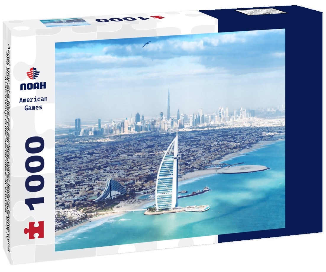 Noah Jigsaw Puzzle Aerial view of a blue sea surface water texture background and sun reflections Dubai seaside skyline and Burj Al Arab luxury hotel aerial view at sunrise 1000 pieces
