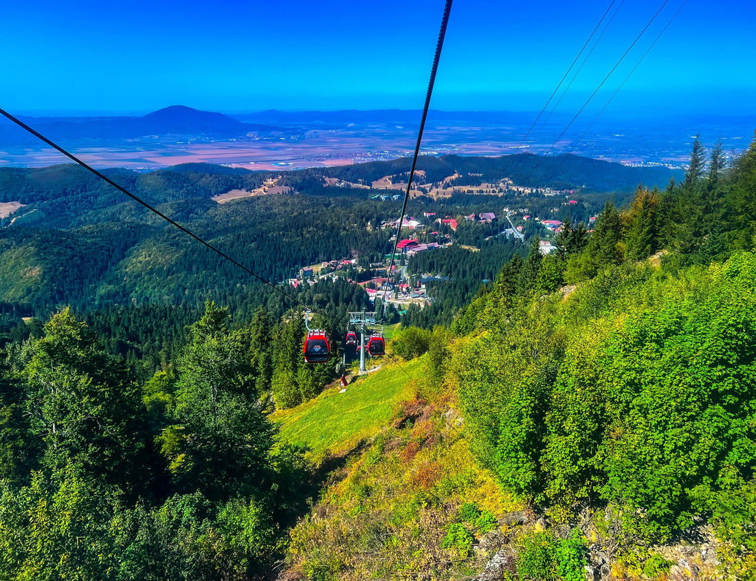 Noah Jigsaw Puzzle A view of red gondolas, and cableways moving to the top of the mountain over the beautiful landscapes around the Carpathian mountains in Poiana Brasov, Romania 1000 pieces