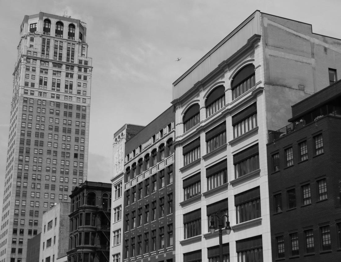 Noah Jigsaw Puzzle Street view from the old town with small wooden houses in the swedish city of Kalmar by the coast of Baltic Sea in black white 1000 pieces